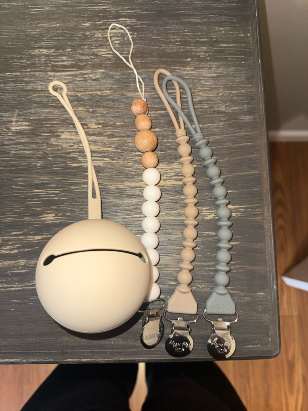 3 pacifier clips and 1 pacifier holder